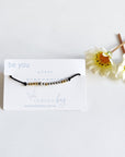 Morse Code Beaded Bracelet - Be You on black cord.