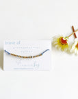 Morse Code Beaded Bracelet - Brave AF with light blue cord