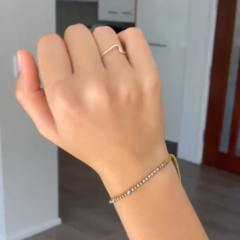 Custom Morse Code Bracelet on a girl's wrist