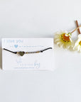 I love you Morse Code and Charm Beaded Bracelet with a stainless steel heart charm on black cord
