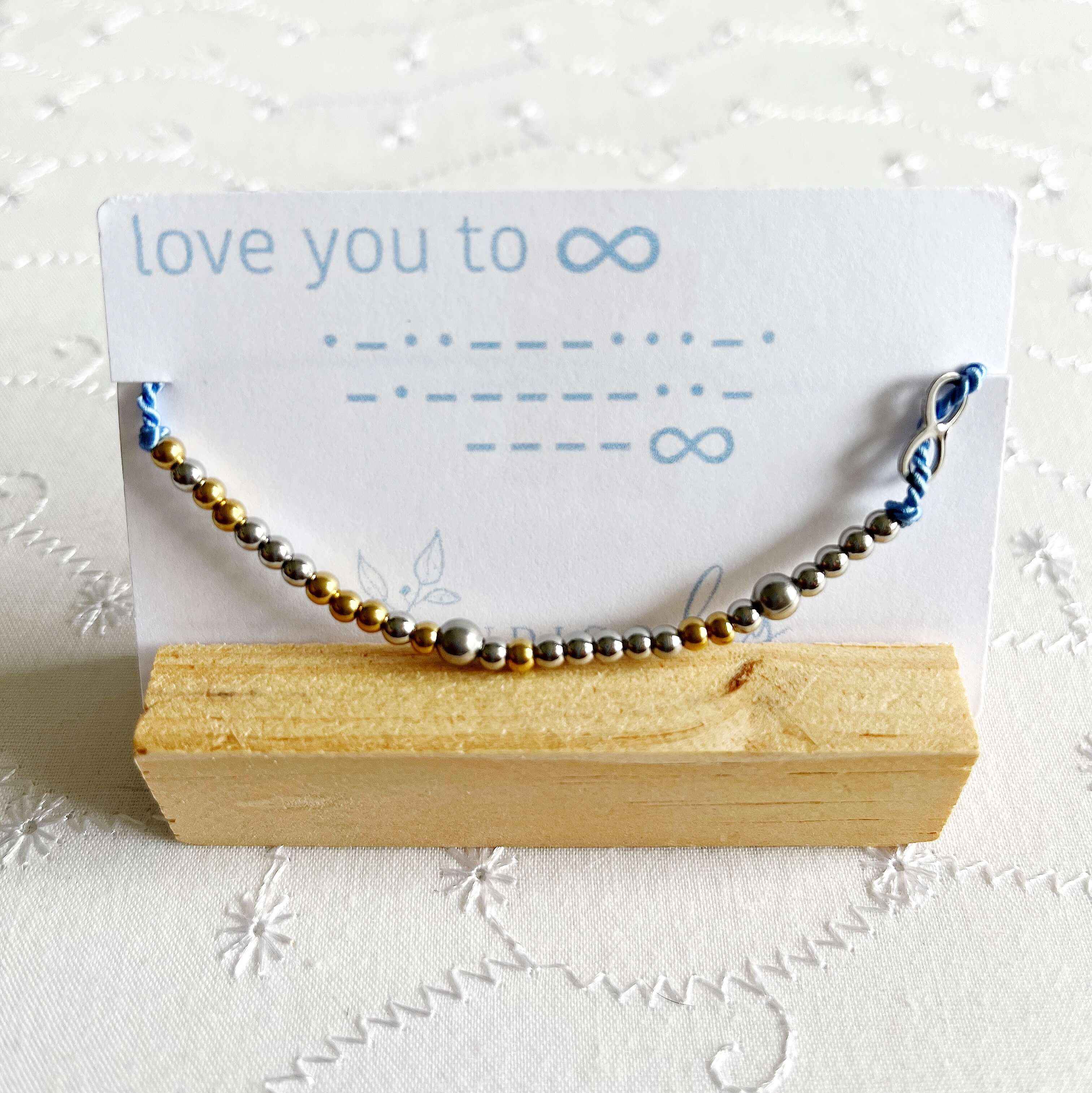 Morse Code and Charm Beaded Bracelet - Love You to Infinity on light blue cord