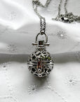 Round cage locket with green ribbon inside - Write Your Wish Necklace