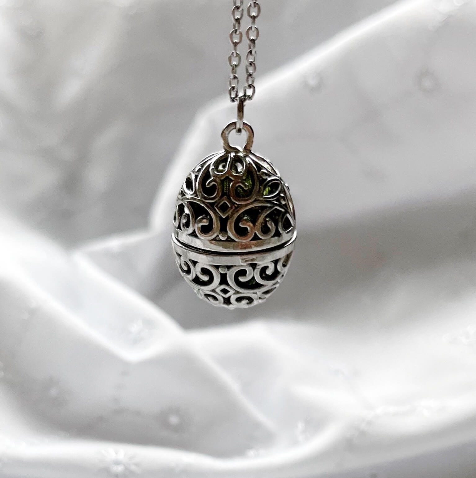 Oval cage locket with green ribbon inside - Write Your Wish Necklace