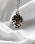 Oval cage locket with green ribbon inside - Write Your Wish Necklace