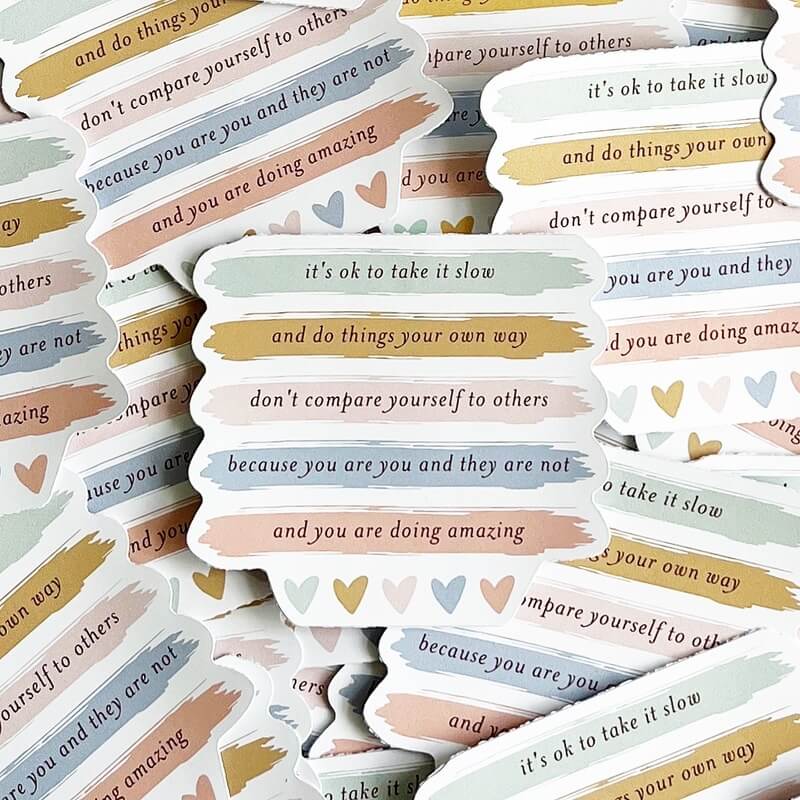 Sticker - it's ok to take it slow and do things your own way don't compare yourselves to others because you are you and they are not and you are doing amazing in pastels with hearts