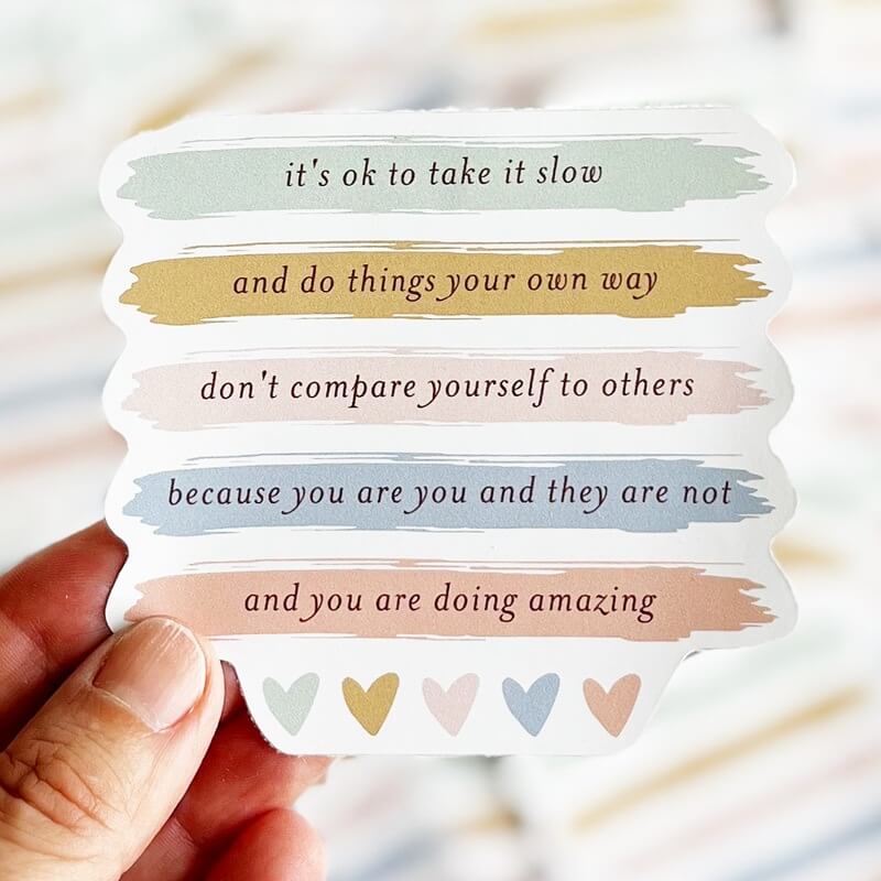 Sticker - it&#39;s ok to take it slow and do things your own way don&#39;t compare yourselves to others because you are you and they are not and you are doing amazing in pastels with hearts