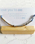 Morse Code and Charm Beaded Bracelet - Love You to Infinity on light blue cord