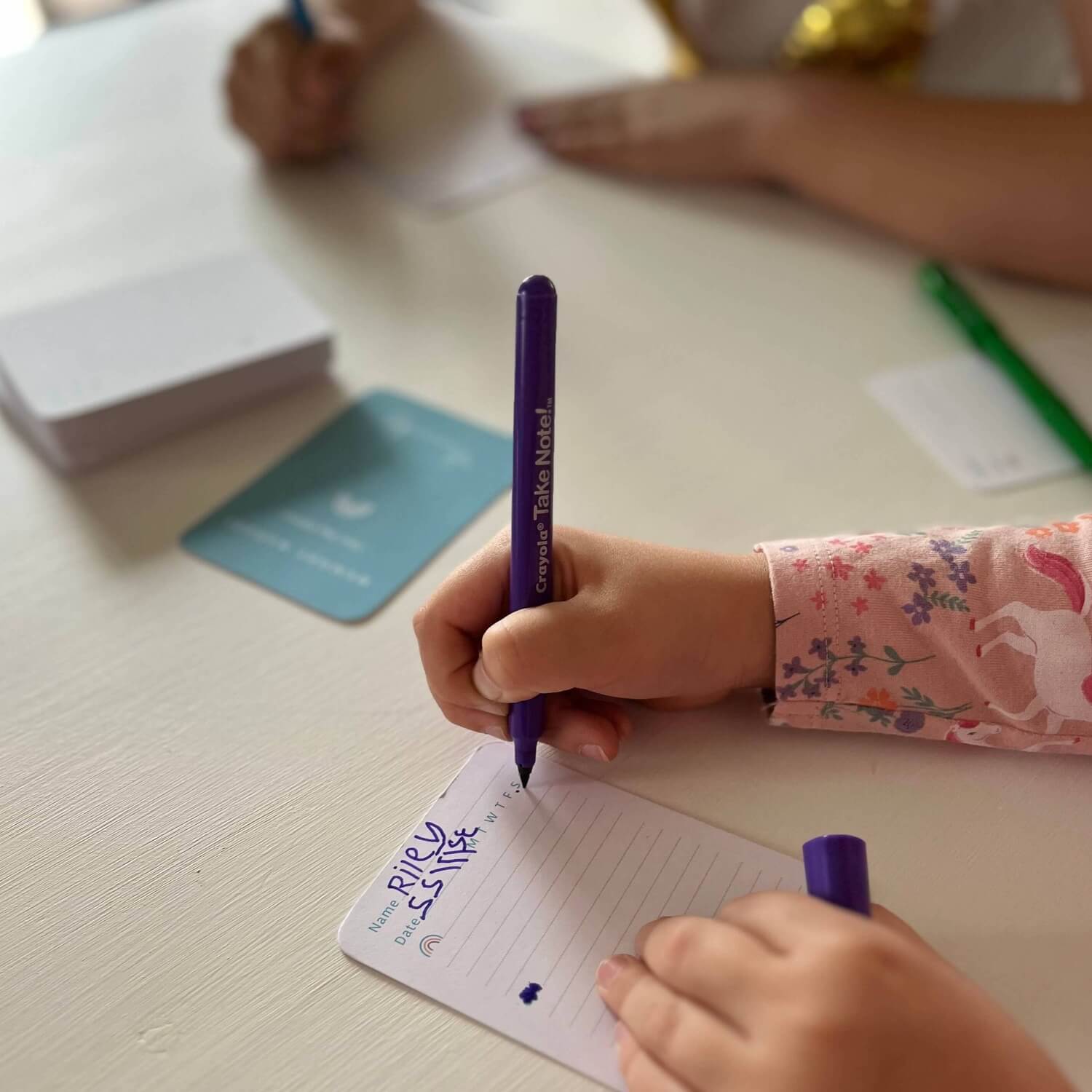 Memory Makers Your Day Edition close up of child writing on card | Journal cards for families