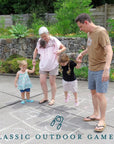 Family playing hopscotch | Memory Makers Family Edition
